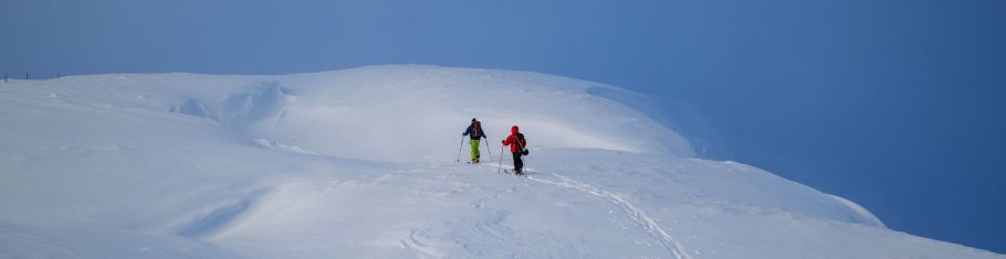 Image of two people ski touring in the Scottish highlands